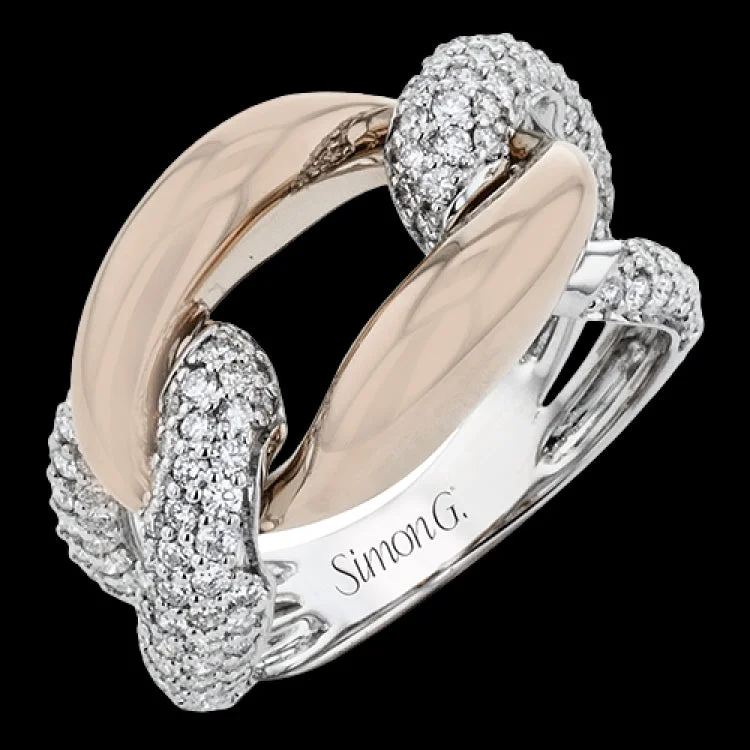 ladies rings timeless beauty -A modern two-tone right hand ring in 18K yellow and white gold, features interlocking links of high polish gold and two diamond links 1.11 ctw.