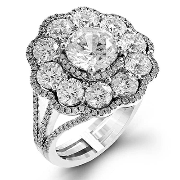 ladies rings anniversary gift idea -The dramatic floral cluster design of this white and rose gold vintage-inspired ring is set with 2.45 ctw round cut white diamonds and .21 ctw pink diamonds.