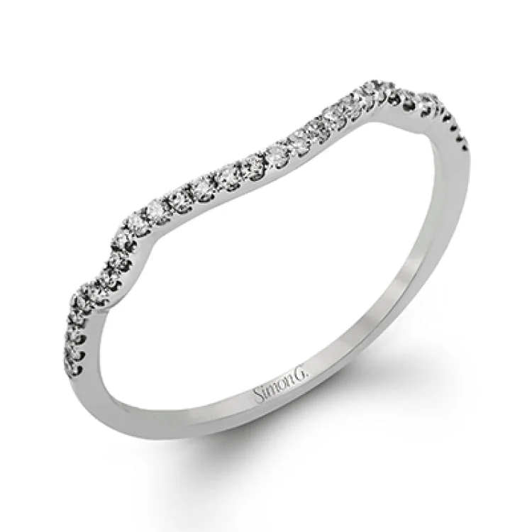 ladies rings handmade unique -Presenting an exquisite modern design with an elegant halo, this white gold ring is accented with .26 ctw glistening round cut white diamonds.